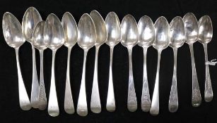 A set of six George III silver teaspoons and eight other teaspoons.