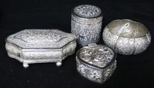 An Indian silver small bowl and three Indian silver boxes including heart shape.