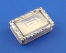 A George IV engine turned silver rectangular vinaigrette by Nathaniel Mills, with reeded sides and