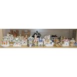 A quantity of Staffordshire cottages etc