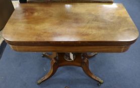 A Regency style folding mahogany tea table, W.92cm