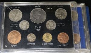 A collection of UK proof coin sets, some silver