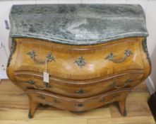 A Louis XV style parquetry inlaid bombe commode, W.110cm