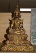 A large Thai gilt bronze figure of Buddha