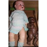 A. M 351.70K, open mouthed baby doll and a Heubach 414.2/0 D.r.g. M. black baby doll