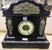 A black marble mantel clock