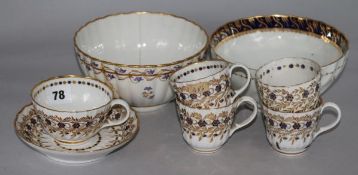 A Worcester part tea and coffee set, Flight period, a similar slops bowl and a Derby slops bowl,