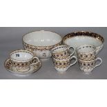 A Worcester part tea and coffee set, Flight period, a similar slops bowl and a Derby slops bowl,