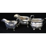Two silver sauceboats and a silver cream jug, 18 oz.
