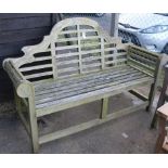 A Lutyens style weathered teak garden bench, W.166cm