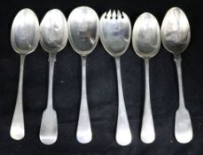 Two silver servers and four tablespoons