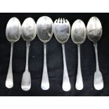 Two silver servers and four tablespoons