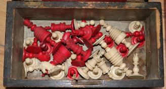 A walnut box of chess pieces