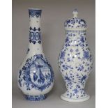 A delft blue and white vase and a Meissen onion pattern lidded vase (2)