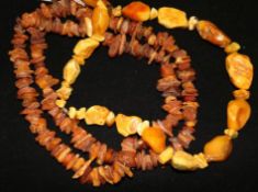 Two amber necklaces, gross weight 215 grams.