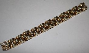 A stylish early 1960's 9ct gold bracelet with demi lune links, 7.25in.