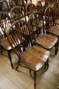 A set of eight elm Windsor dining chairs