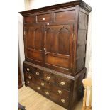 A mid 18th century oak bacon cupboard, W.145cm H.186cm