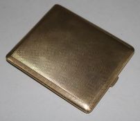 A 1940's engine turned 9ct gold cigarette case, 3.75in.
