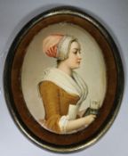 A German oval porcelain plaque, depicting a serving maid