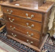 A George III style mahogany chest, fitted four long drawers