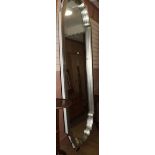 A large silver framed mirror, H.250cm