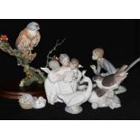 A collection of Lladro figures