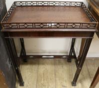 A mahogany 'silver' table, with pierced gallery and cluster column legs, W.58cm