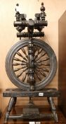 A Victorian ebonised spinning wheel, H.87cm