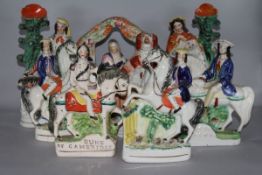 A collection of eight 19th century Staffordshire pottery flatbacks