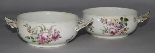 A pair of Chelsea red anchor two handled bowls, painted with floral bouquets, c.1755 (both heavily