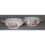 A pair of Chelsea red anchor two handled bowls, painted with floral bouquets, c.1755 (both heavily