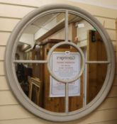 A grey circular panelled mirror, W.88cm