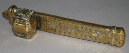 A Persian brass scribe set