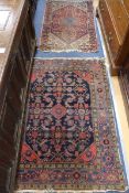 Two small Persian rugs, 122cm x 76cm, 140 x 102cm (both with frayed ends)