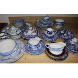 A Staffordshire pottery blue and white vegetable tureen and a quantity of other blue and white