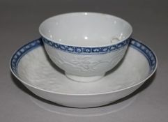 A Liverpool blue and white teabowl and saucer, possibly Philip Christian, moulded in relief with