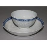 A Liverpool blue and white teabowl and saucer, possibly Philip Christian, moulded in relief with