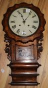 A Victorian inlaid walnut drop dial eight day wall clock