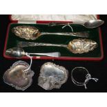 A quantity of silver berry spoons etc