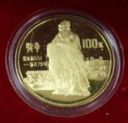 A Chinese gold proof 100 yuan coin, 1985