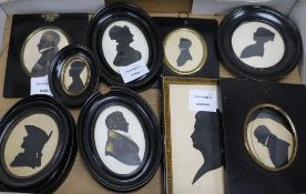 A collection of ten framed silhouettes