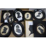 A collection of ten framed silhouettes