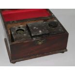 A George III mahogany tea caddy, fitted pewter tea canisters