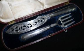 A cased pair of Victorian engraved silver fish servers by John Gamage, Birmingham, 1847.