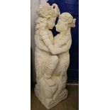 A garden statue of figures embracing, H.125cm