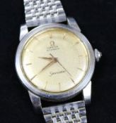 A gentleman's 1950's steel Omega Seamaster automatic wrist watch and a Rolex strap.