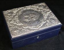 A blue leather jewellery box, silver mounted with angelle forms