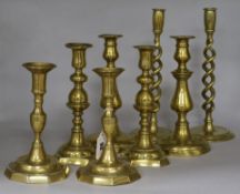 Four pairs of Victorian brass candlesticks