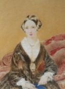 Victorian School, a watercolour miniature portrait of a young lady